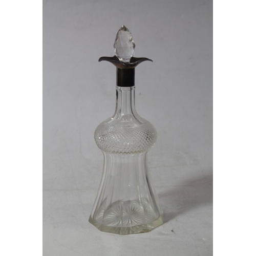 226 - Thistle shaped decanter with hobnail cut band having silver mount, with four pourers, 27cm high.