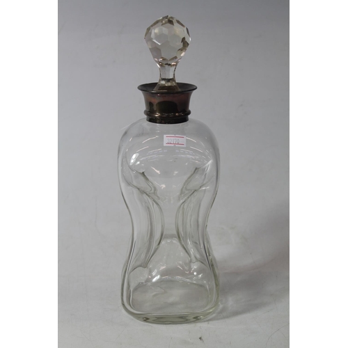 227 - Glass decanter of waisted form with silver collar, 31cm high.