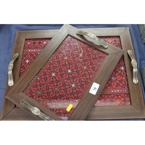 78 - Pair of modern hardwood nesting trays with inset needlework tapestries, largest 46cm wide.