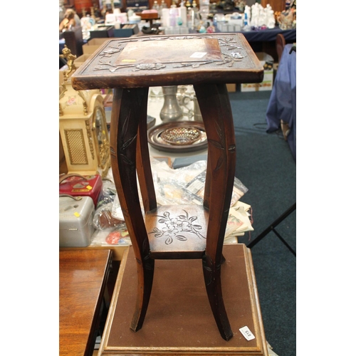 814 - Early 20th century plant stand carved with prunus blossom, 61cm high.