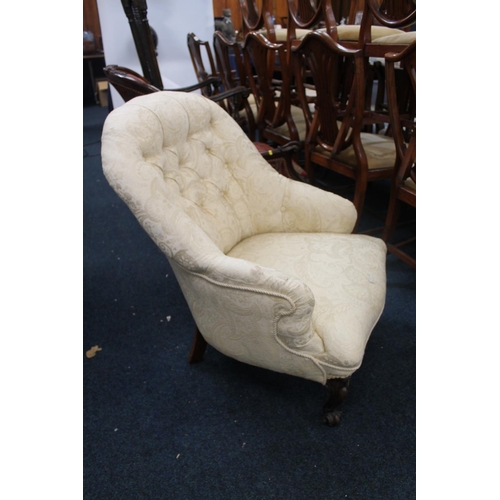 827 - Late Victorian button back cream upholstered armchair.