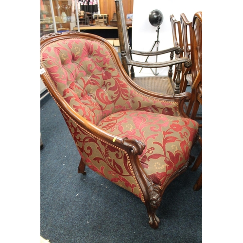 828 - Walnut framed upholstered button back armchair, 91cm high.