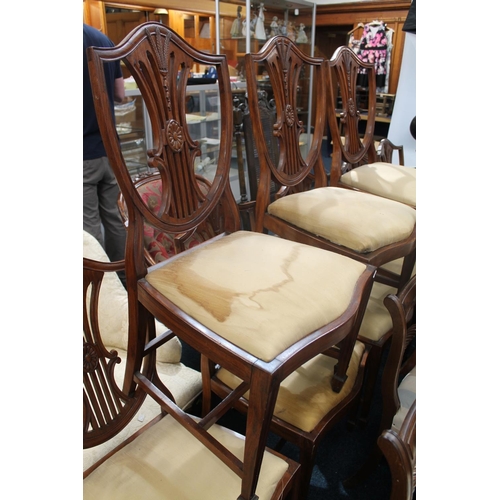 832 - Set of eight mahogany shield back dining chairs and two matching carvers