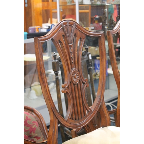 832 - Set of eight mahogany shield back dining chairs and two matching carvers