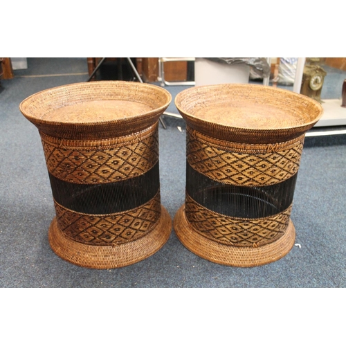 834 - Pair of African style bergere conservatory stools