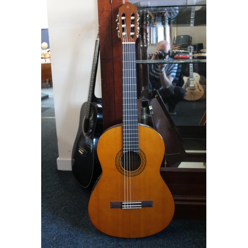 422 - Yamaha CX40 six string acoustic guitar. 