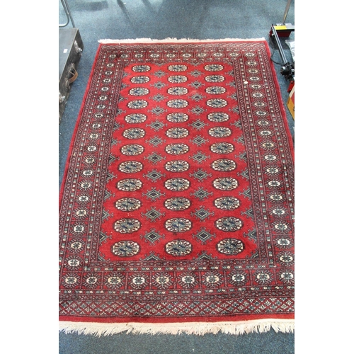 806 - Bokhara rug, 186cm x 124cm.