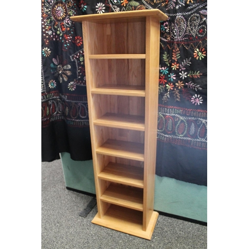 826 - Light oak cd rack, 112cm high.