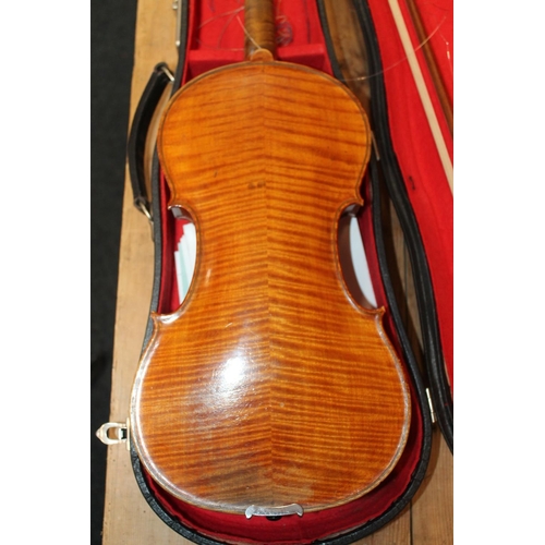 396 - Antique violin in hard case and bow.