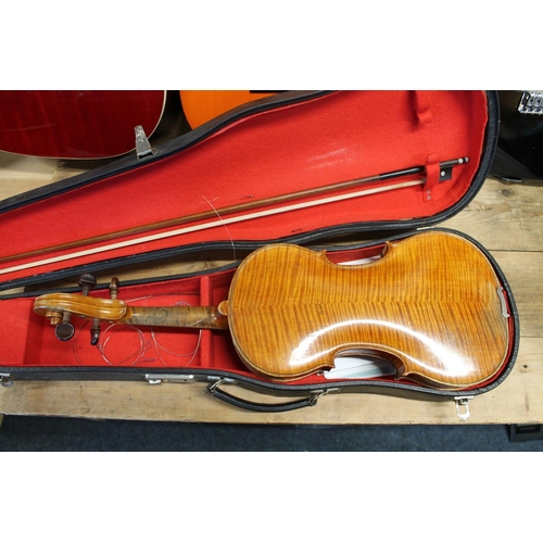 396 - Antique violin in hard case and bow.