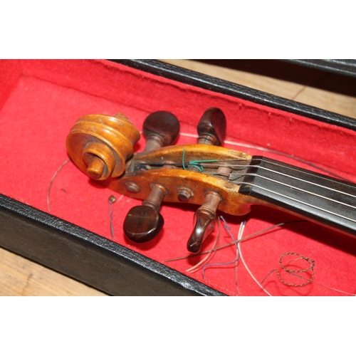 396 - Antique violin in hard case and bow.