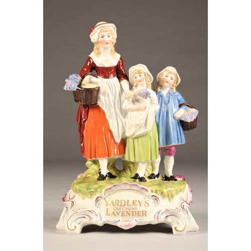 31 - Dresden porcelain advertising figure group, Yardley's old English lavender (restored) height 30cm