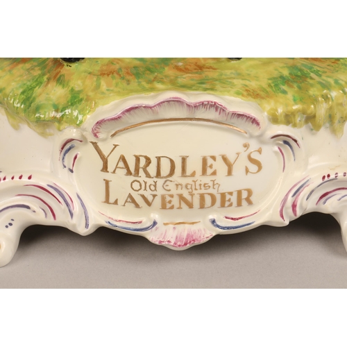 31 - Dresden porcelain advertising figure group, Yardley's old English lavender (restored) height 30cm