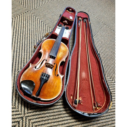 595 - German Violin, circa 1900, length of back 360mm, unlabelled with two bows in case