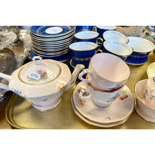 335 - Carlton ware blue and gilt teaware and a Plant Tuscan tea for two set.