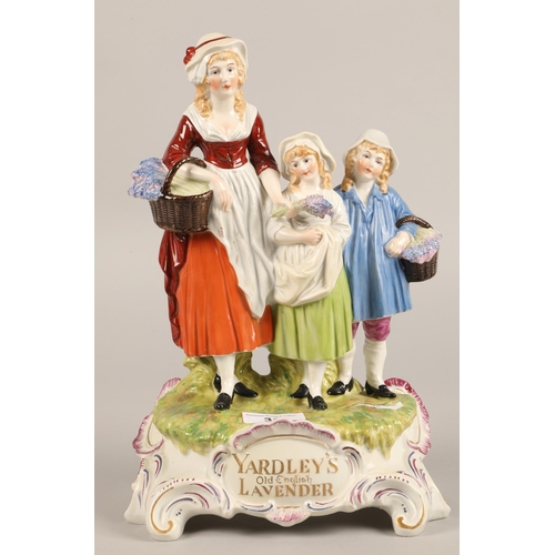 31 - Dresden porcelain advertising figure group, Yardley's old English lavender (restored) height 30cm