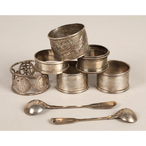 265 - Six white metal napkin rings including hallmarked silver, Chinese, etc. and two sugar spoons, gross ... 