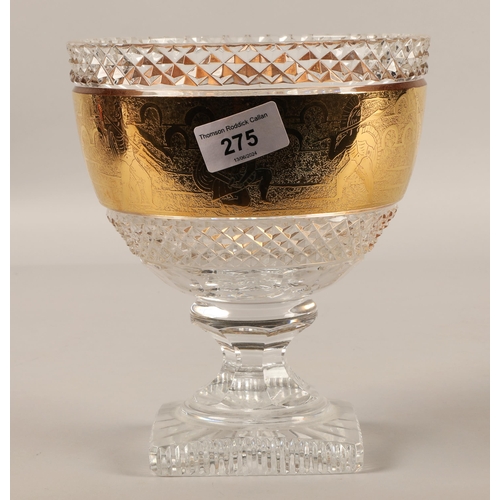 275 - Cut glass crystal pedestal bowl with a gilded gladiator design, 20cm h x 17cm d