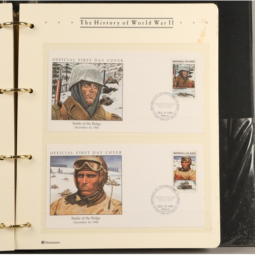 305 - Three albums containing various 'The History of World War II' first day covers and commemorative coi... 