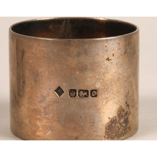 249 - Silver beaker and two napkin rings, assorted hallmarks, gross weight 141g