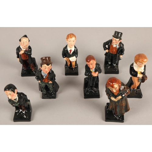 257 - Eight Royal Doulton Dickens character figures including Artful Dodger, Oliver Twist, etc