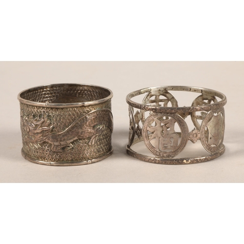 265 - Six white metal napkin rings including hallmarked silver, Chinese, etc. and two sugar spoons, gross ... 