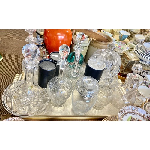 324 - Collection of glassware to include decanters, claret jug, condiments paperweight etc.