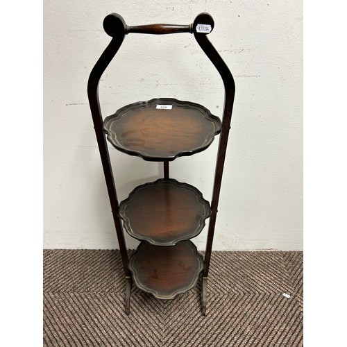 576 - Mahogany three-tier cake stand, 94cm high