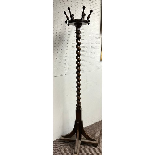 581 - Mahogany barley twist coat stand, 179cm high