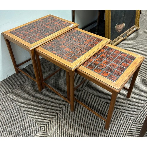 593 - Nest of three tile top side tables