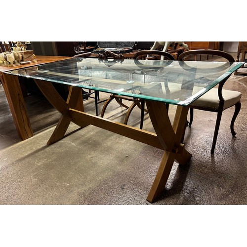 604 - Contemporary glass topped dining table, H 77cm, W 180cm, D 90cm