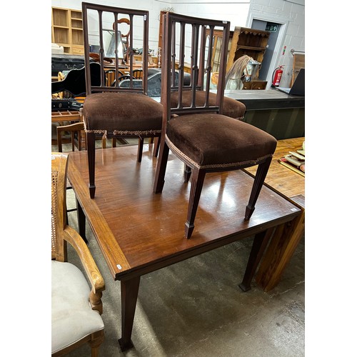 614 - Mahogany pull out dinning table with three matching brown dining chairs in brown upholstery