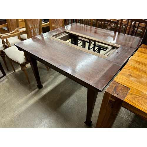 614 - Mahogany pull out dinning table with three matching brown dining chairs in brown upholstery