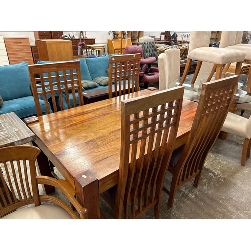 624 - Contemporary dining table with four high backed  mackintosh style chairs, brown leather seats, dimen... 