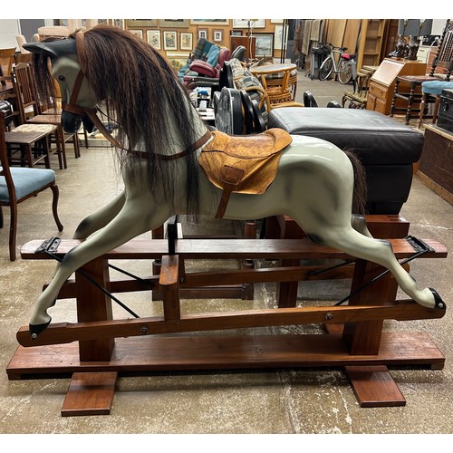 645 - Rocking horse, H 137cm, W 181cm, D 57cm