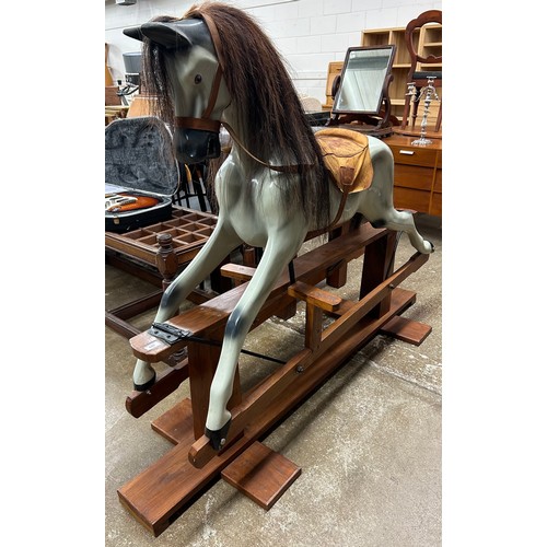 645 - Rocking horse, H 137cm, W 181cm, D 57cm