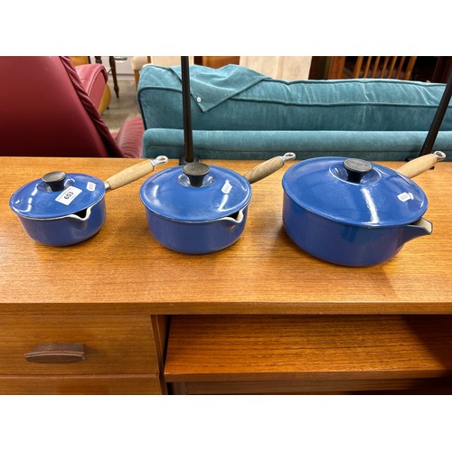 653 - Three matching Le Creuset pots of different sizes, 14cm, 18cm, and 22cm