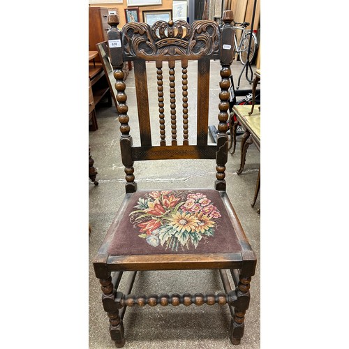 658 - Carved oak bobbin chair with floral upholstery 