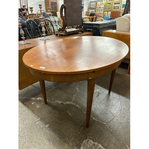 671 - Folding mid-century oval dining table, H 75cm, W 137cm, D 96cm