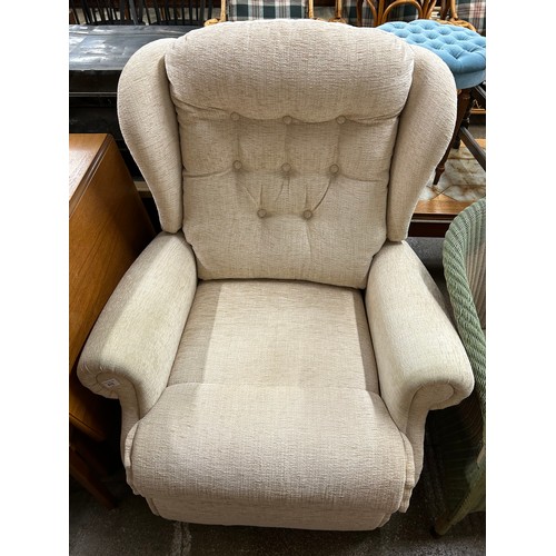 676 - Cream reclining armchair