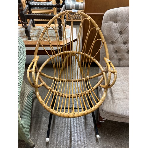 679 - Rattan rocking chair 