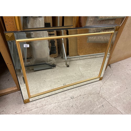 695 - Wall mirror with gilt border, 74cm x 105cm