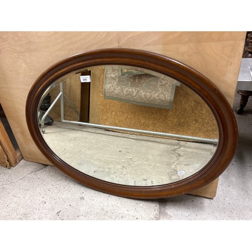 696 - Mahogany framed oval wall mirror