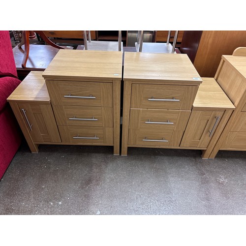 699 - Bedroom suite comprising pair bedside chest of drawers, side unit and two over three chest 