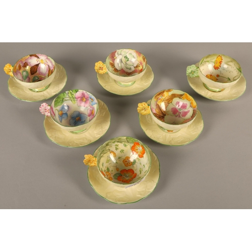 714 - Paragon hand painted set of six flower-handled teacups and saucers, some restoration