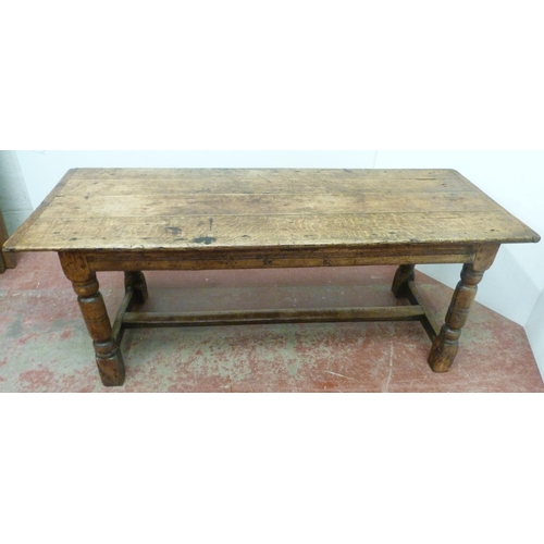 504 - Jacobean Revival jointed oak refectory table with fixed plank top above reeded frieze, on turned col... 