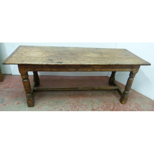 504 - Jacobean Revival jointed oak refectory table with fixed plank top above reeded frieze, on turned col... 