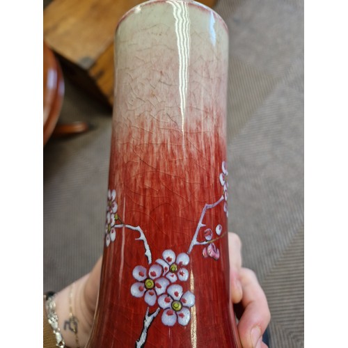 32 - Pair glazed oriental vases with foliage design, 39cm high