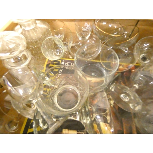 121 - Box of glassware to include Babycham glasses, champagne glasses etc.