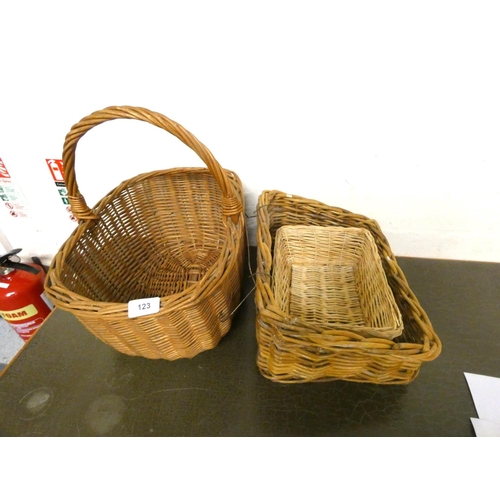 123 - Three wicker baskets.